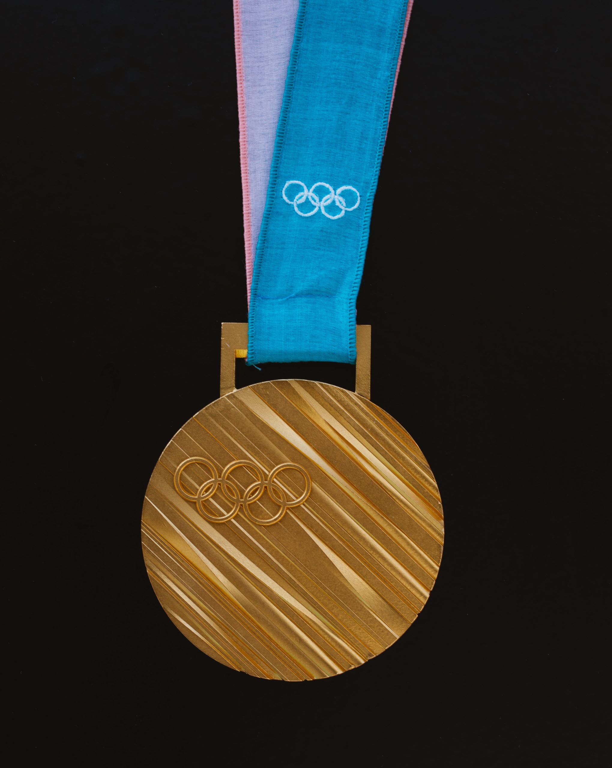gold-colored Olympics medallion